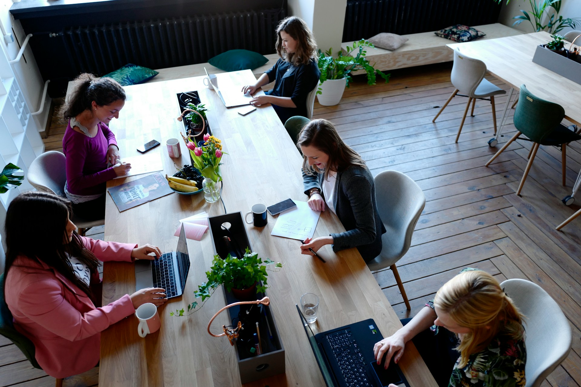 Image showing users working together on a project that is streamlined by a project management software